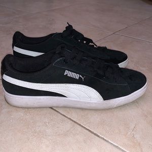Black and white Puma sneakers